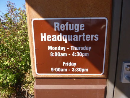 Sign at Refuge Headquarters - “[Open] Monday - Thursday 8:00am - 4:30pm - Friday 9:00am - 3:30pm”